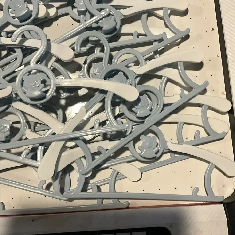 Lot of 19 Grey Extending Hangers for Children Clothes Bear